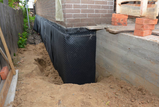 Happy homeowners after waterproofing job in Pittstown